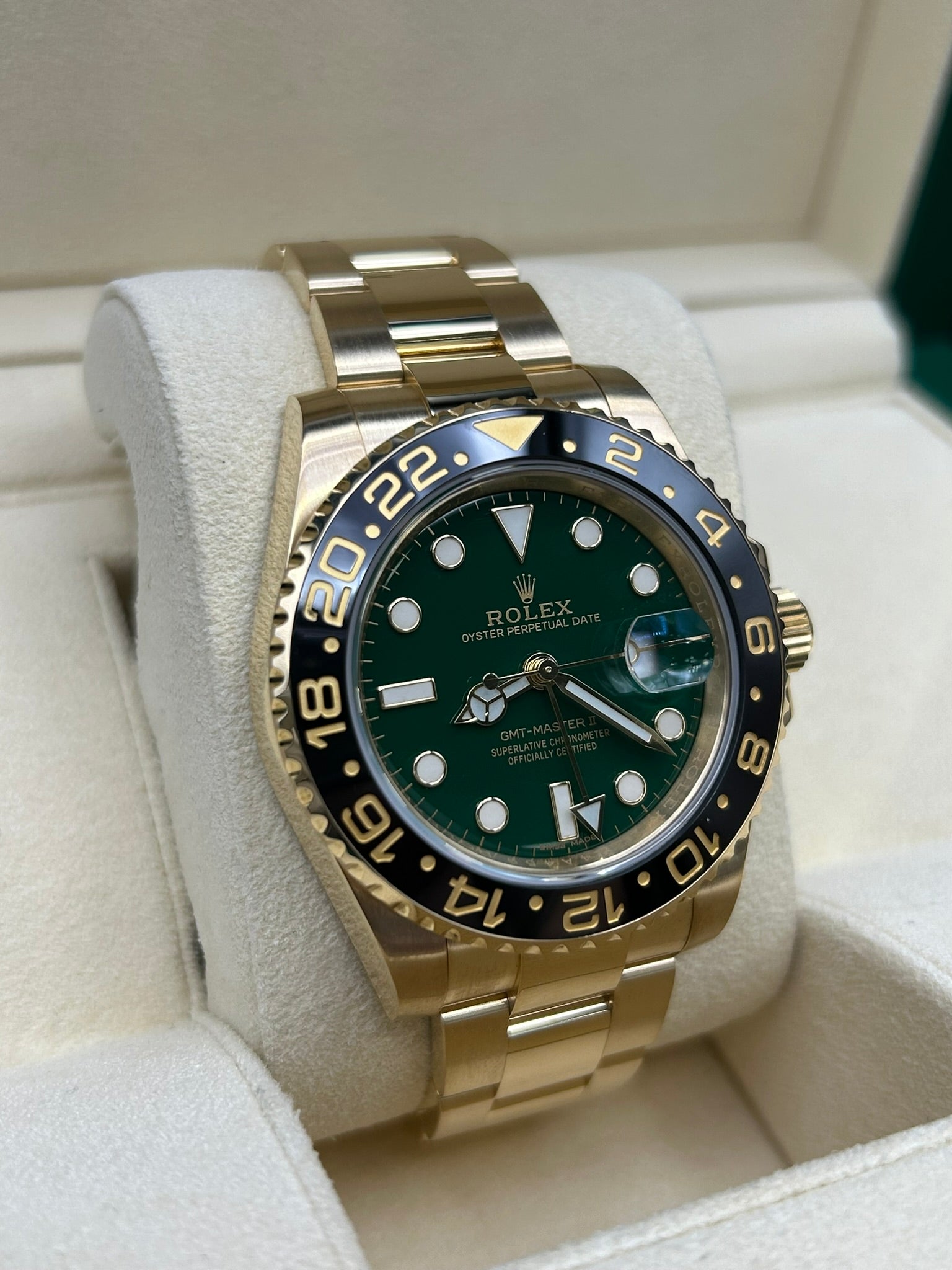 Rolex GMT-Master II Yellow Gold Green Dial 116718LN detail view